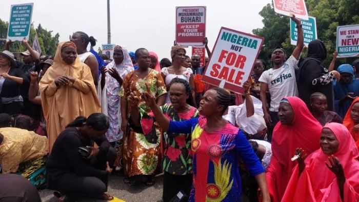 Protesters besiege PEPC, call out INEC chair, Tinubu for electoral fraud